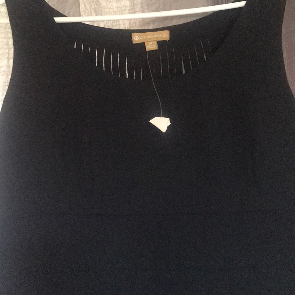 Limited edition black dress with peep back size 14